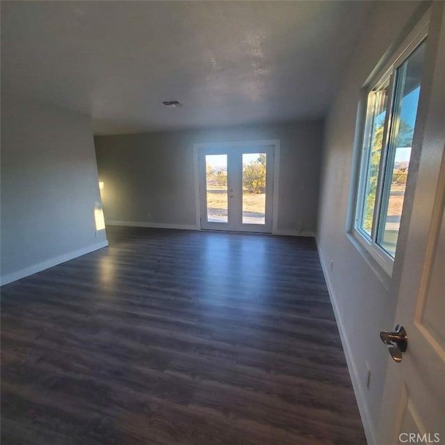 58922 Sunway Dr, Yucca Valley, CA 92284 - spare room featuring dark wood-type flooring and baseboards