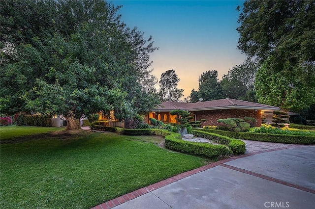 20827 E Mesarica Rd, Covina, CA 91724 - view of front facade with a front lawn