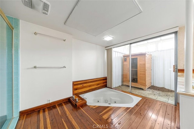 20827 E Mesarica Rd, Covina, CA 91724 - full bathroom featuring wood-type flooring and a jetted tub