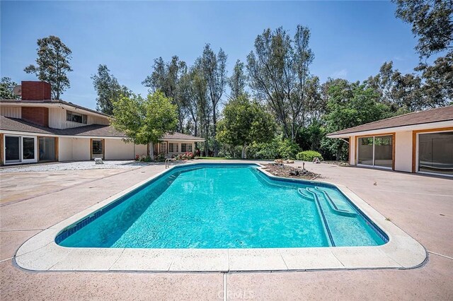 20827 E Mesarica Rd, Covina, CA 91724 - swimming pool with a patio