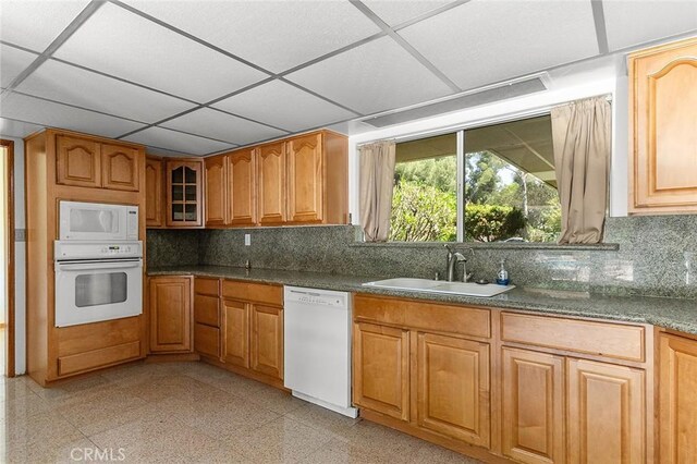 20827 E Mesarica Rd, Covina, CA 91724 - kitchen with white appliances, a sink, a paneled ceiling, granite floors, and decorative backsplash
