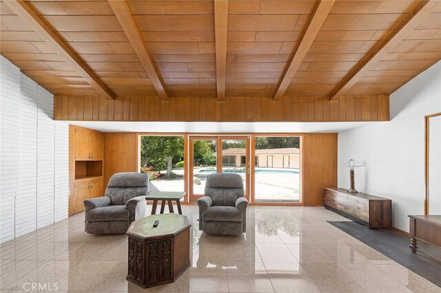 20827 E Mesarica Rd, Covina, CA 91724 - living area featuring wooden ceiling with exposed beams and wooden walls