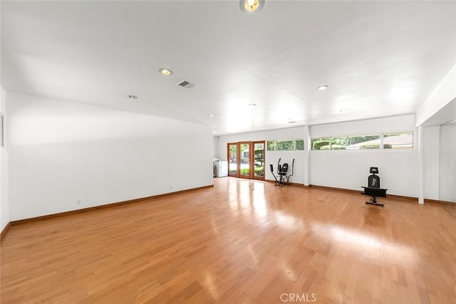 20827 E Mesarica Rd, Covina, CA 91724 - unfurnished living room featuring plenty of natural light, light wood-type flooring, baseboards, and recessed lighting