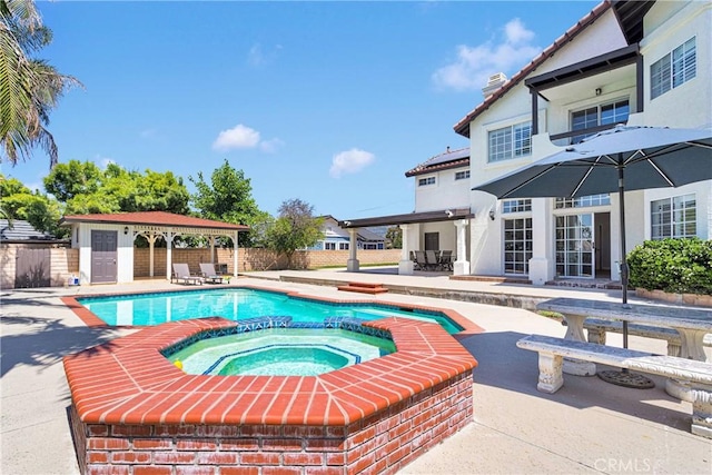 1048 Gladstone St, La Verne, CA 91750 - view of pool with a patio, a gazebo, and a pool with connected hot tub