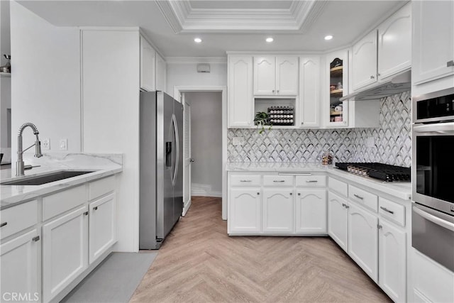 1048 Gladstone St, La Verne, CA 91750 - kitchen featuring stainless steel appliances, a sink, recessed lighting, ornamental molding, and a raised ceiling