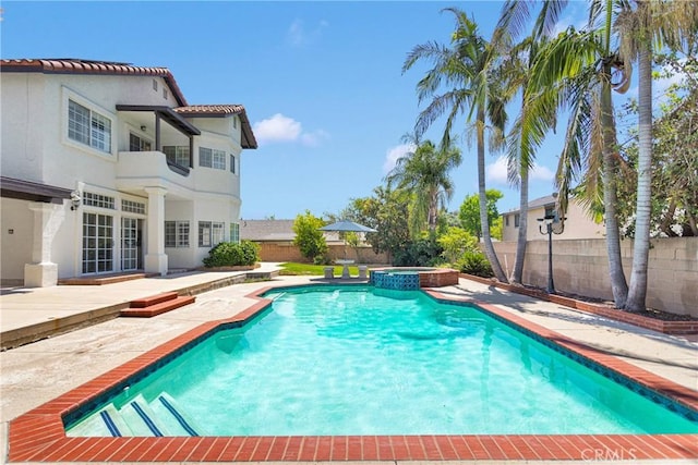 1048 Gladstone St, La Verne, CA 91750 - view of swimming pool with a fenced backyard, a patio area, french doors, and a pool with connected hot tub