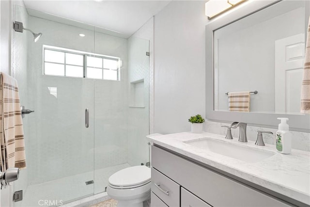 1048 Gladstone St, La Verne, CA 91750 - bathroom with vanity, a shower stall, and toilet