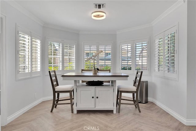 1048 Gladstone St, La Verne, CA 91750 - dining area featuring baseboards, plenty of natural light, and crown molding