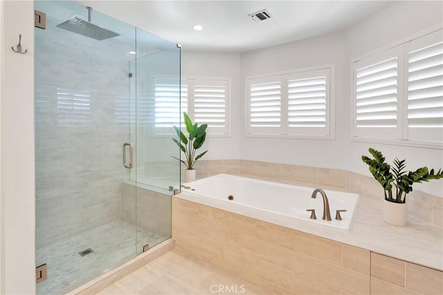 1048 Gladstone St, La Verne, CA 91750 - full bathroom featuring a tub with jets, a stall shower, and tile patterned floors