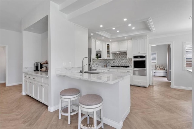 1048 Gladstone St, La Verne, CA 91750 - kitchen featuring a sink, a warming drawer, oven, ornamental molding, and baseboards