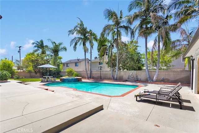 1048 Gladstone St, La Verne, CA 91750 - view of pool with a fenced backyard, a patio area, and a pool with connected hot tub
