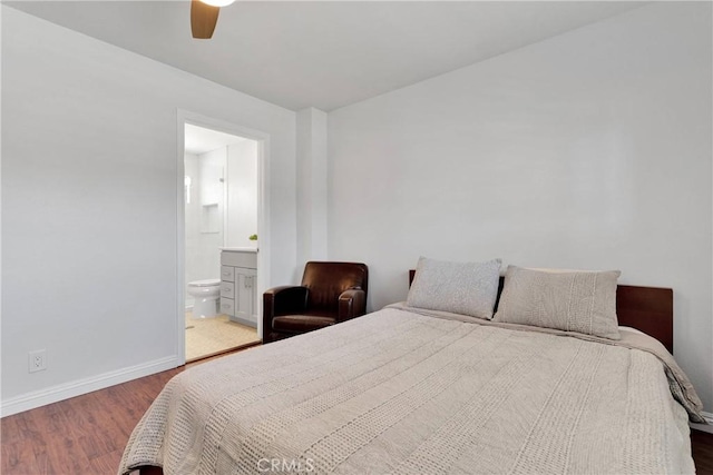 1048 Gladstone St, La Verne, CA 91750 - bedroom with wood finished floors, baseboards, connected bathroom, and a ceiling fan