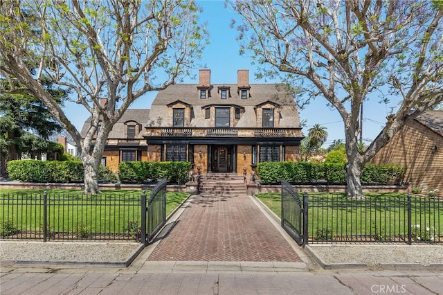 11 La Linda Dr, Long Beach, CA 90807 - view of front facade with a gate, a chimney, and brick siding