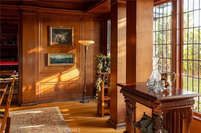 11 La Linda Dr, Long Beach, CA 90807 - hallway featuring wood finished floors, wooden walls, and crown molding