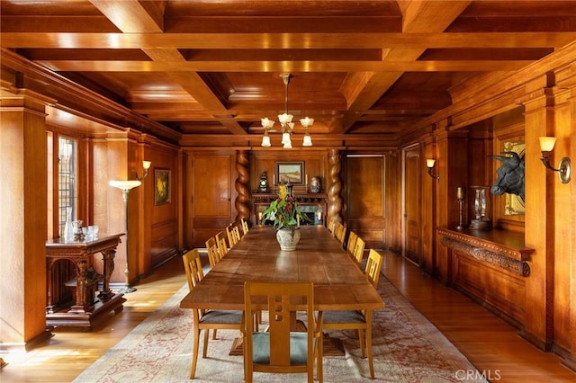 11 La Linda Dr, Long Beach, CA 90807 - dining space featuring wood ceiling with exposed beams, wooden walls, a chandelier, wood finished floors, and crown molding