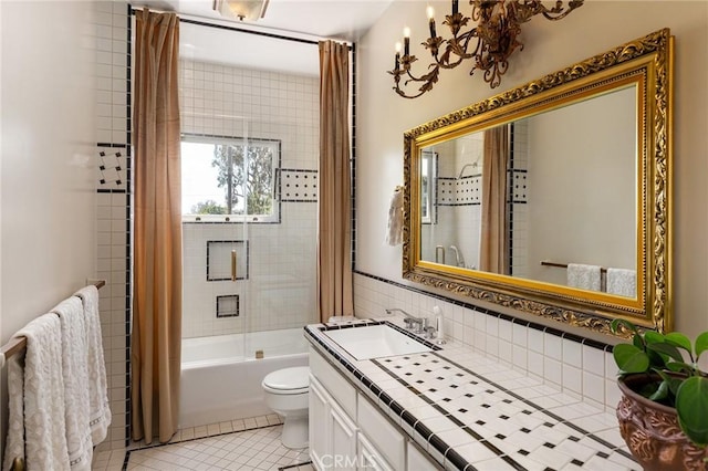 11 La Linda Dr, Long Beach, CA 90807 - bathroom with tile patterned flooring, toilet, vanity, shower / bathtub combination with curtain, and decorative backsplash