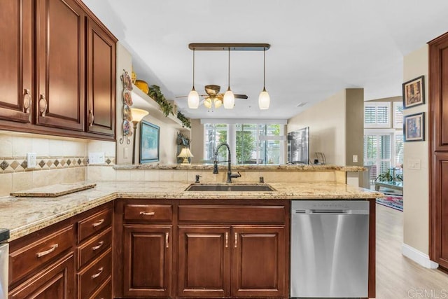 1873 Key Largo Rd, Vista, CA 92081 - kitchen featuring dishwasher, a sink, decorative backsplash, a peninsula, and light stone counters