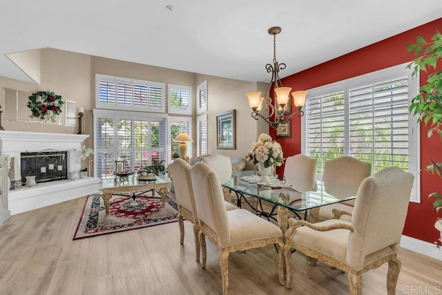 1873 Key Largo Rd, Vista, CA 92081 - dining space featuring a chandelier, wood finished floors, and healthy amount of natural light