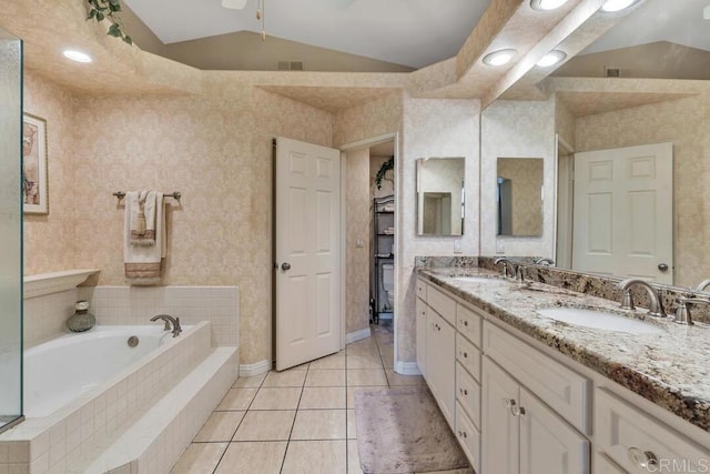1873 Key Largo Rd, Vista, CA 92081 - full bathroom with double vanity, a bath, tile patterned floors, vaulted ceiling, and a closet