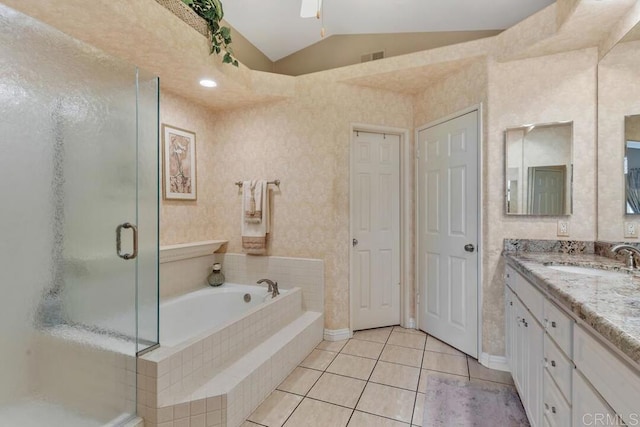 1873 Key Largo Rd, Vista, CA 92081 - bathroom featuring vanity, lofted ceiling, a shower stall, a garden tub, and tile patterned flooring