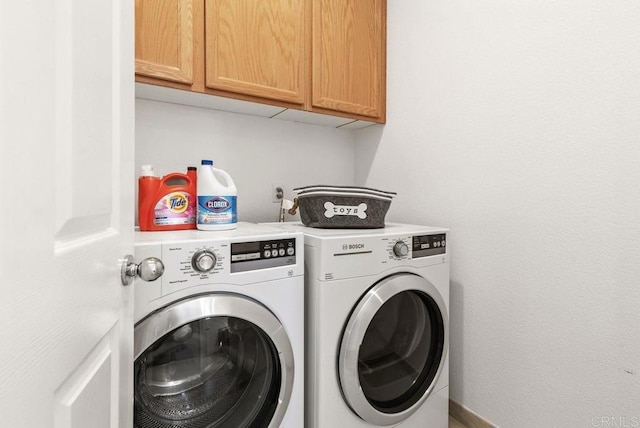 16863 Abundante St, San Diego, CA 92127 - laundry room featuring cabinet space and washing machine and dryer
