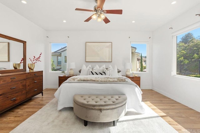 16863 Abundante St, San Diego, CA 92127 - bedroom with light wood finished floors, recessed lighting, baseboards, and ceiling fan