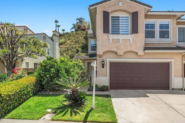 16863 Abundante St, San Diego, CA 92127 - view of front facade featuring stucco siding, an attached garage, and driveway