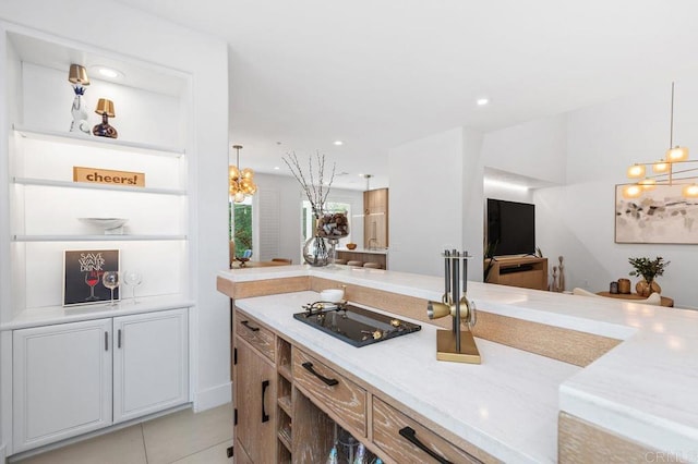 16863 Abundante St, San Diego, CA 92127 - kitchen with light tile patterned floors, pendant lighting, and recessed lighting
