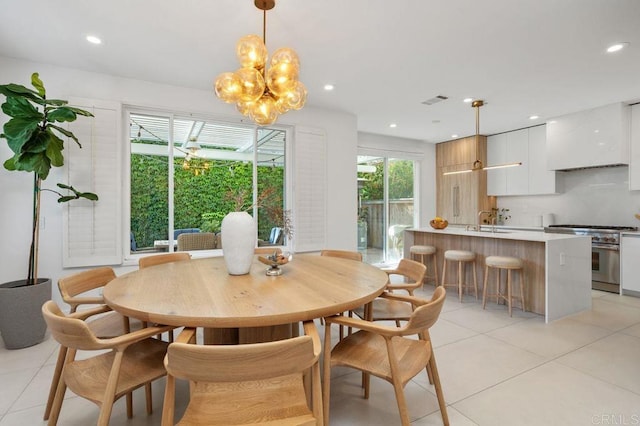 16863 Abundante St, San Diego, CA 92127 - dining space featuring light tile patterned flooring, recessed lighting, and a chandelier
