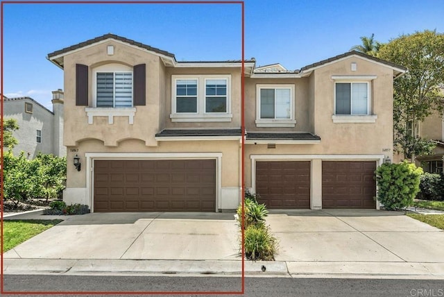 16863 Abundante St, San Diego, CA 92127 - view of front of property featuring a garage, stucco siding, and driveway