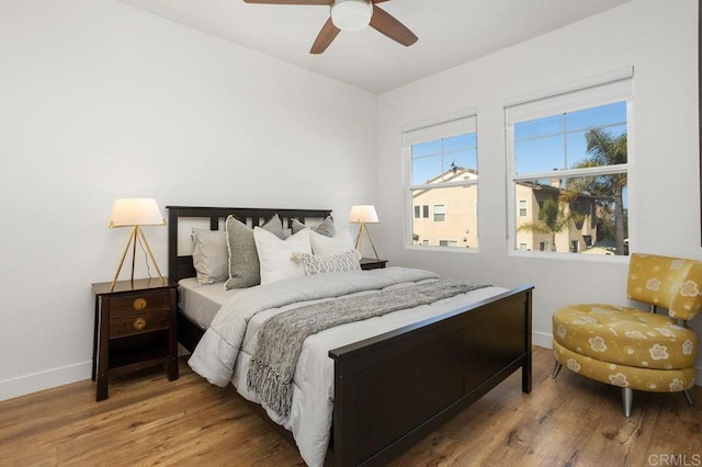 16863 Abundante St, San Diego, CA 92127 - bedroom featuring baseboards, wood finished floors, and ceiling fan