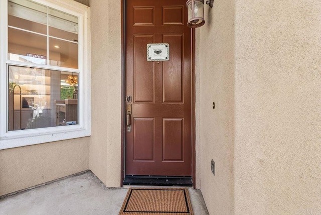 16863 Abundante St, San Diego, CA 92127 - doorway to property featuring stucco siding