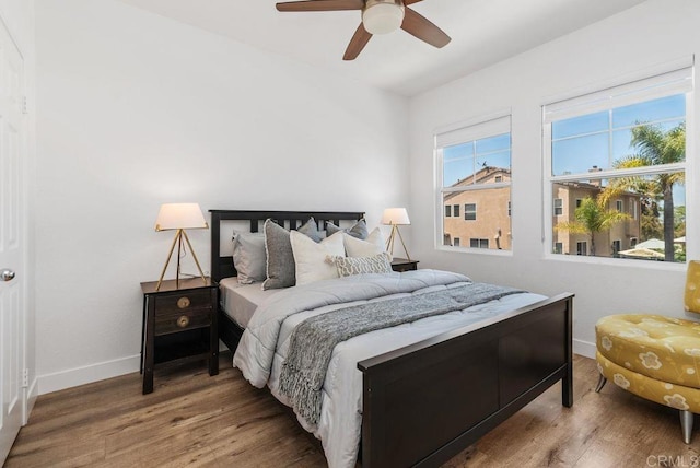 16863 Abundante St, San Diego, CA 92127 - bedroom with baseboards, wood finished floors, and ceiling fan