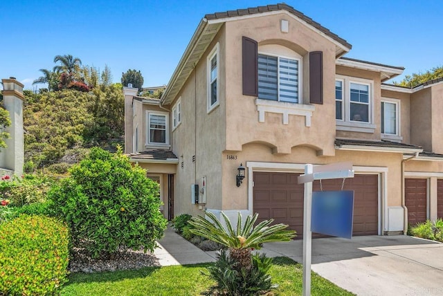 16863 Abundante St, San Diego, CA 92127 - view of front of house with stucco siding, an attached garage, and concrete driveway