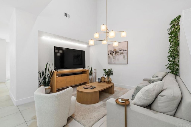 16863 Abundante St, San Diego, CA 92127 - living area with a high ceiling, baseboards, a chandelier, and light tile patterned floors