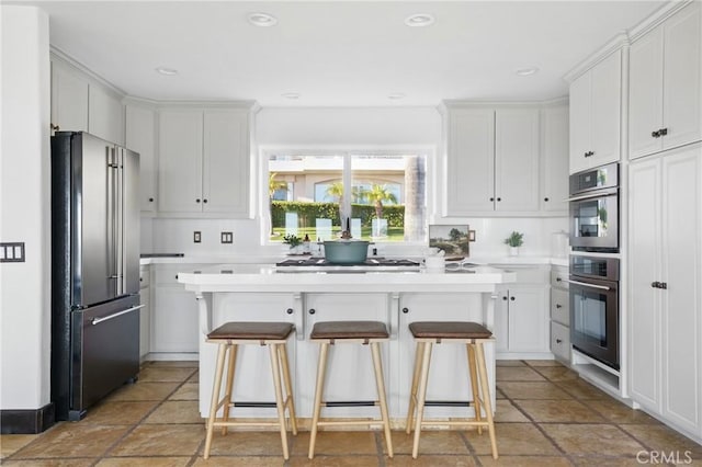 2585 Barcelona, Pismo Beach, CA 93449 - kitchen with stainless steel appliances, light countertops, white cabinets, and recessed lighting
