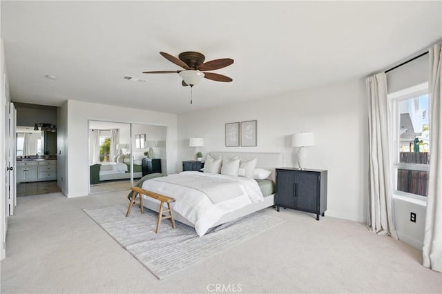 2585 Barcelona, Pismo Beach, CA 93449 - bedroom featuring light colored carpet, multiple windows, a ceiling fan, and a closet