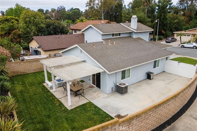 26882 Ayamonte, Mission Viejo, CA 92692 - rear view of property featuring a shingled roof, central AC unit, a pergola, stucco siding, and a patio area