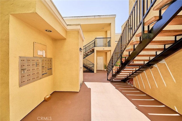 300 E Providencia Ave Unit 211, Burbank, CA 91502 - stairway with mail area and a towering ceiling