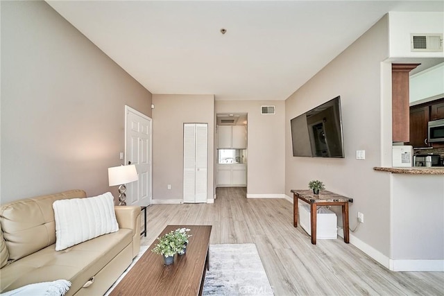 300 E Providencia Ave Unit 211, Burbank, CA 91502 - living room with light wood-style flooring and baseboards