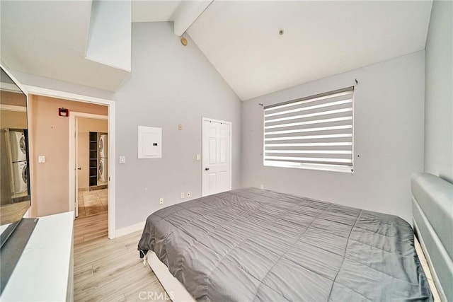 300 E Providencia Ave Unit 211, Burbank, CA 91502 - bedroom featuring light wood-style floors, beamed ceiling, high vaulted ceiling, and baseboards