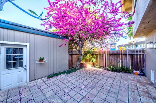 4394 Dina Ct, Cypress, CA 90630 - fenced backyard with a patio area