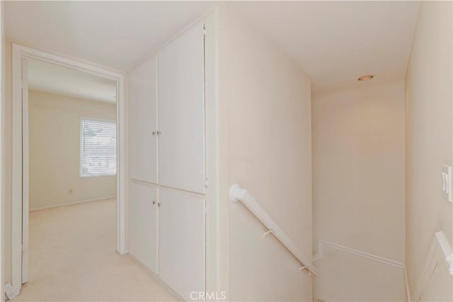 4394 Dina Ct, Cypress, CA 90630 - hall featuring an upstairs landing, light colored carpet, and baseboards
