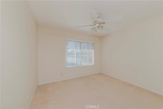 4394 Dina Ct, Cypress, CA 90630 - spare room featuring carpet floors, baseboards, and a ceiling fan