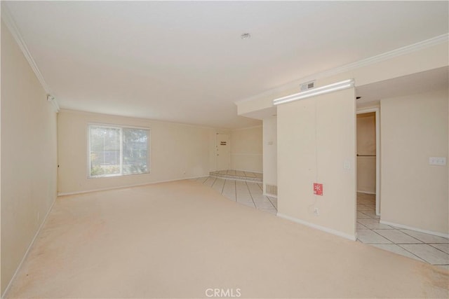 4394 Dina Ct, Cypress, CA 90630 - carpeted empty room with crown molding, tile patterned flooring, and baseboards