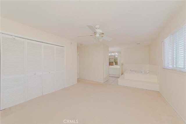 4394 Dina Ct, Cypress, CA 90630 - unfurnished bedroom featuring a closet, carpet, baseboards, and connected bathroom