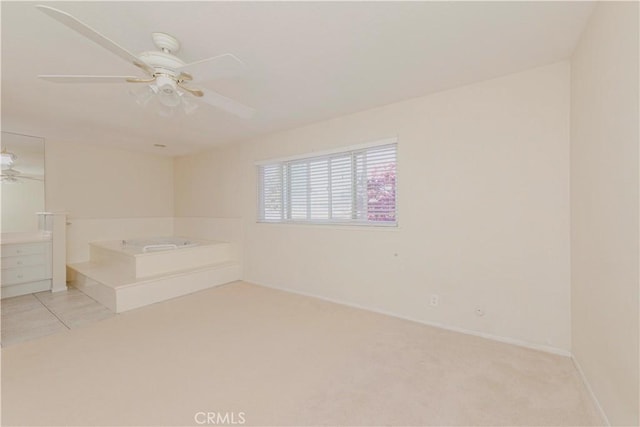 4394 Dina Ct, Cypress, CA 90630 - unfurnished room featuring a ceiling fan, baseboards, and light colored carpet