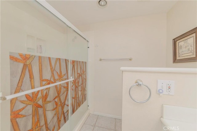 4394 Dina Ct, Cypress, CA 90630 - bathroom featuring tile patterned flooring, an enclosed shower, and baseboards