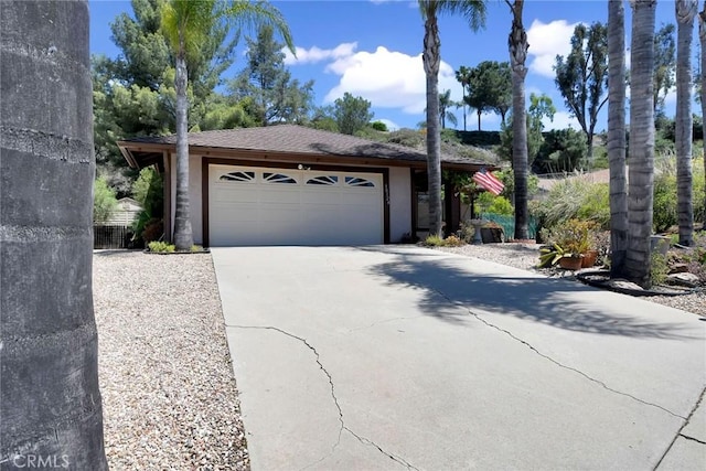 30124 Casa Chata Pl, Temecula, CA 92592 - view of front of home featuring an attached garage, driveway, stucco siding, and a shingled roof