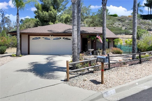 30124 Casa Chata Pl, Temecula, CA 92592 - view of front of home featuring driveway, an attached garage, stucco siding, and a shingled roof
